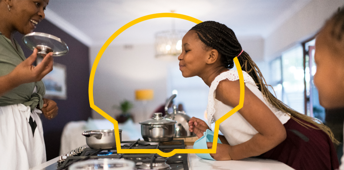 A happy family cooking with Shell Gas.